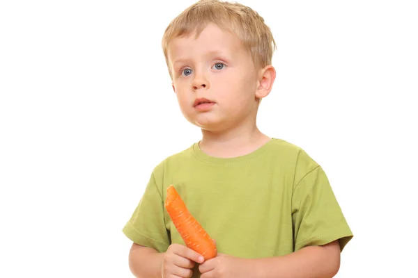 Kid and carrot — Stock Photo, Image
