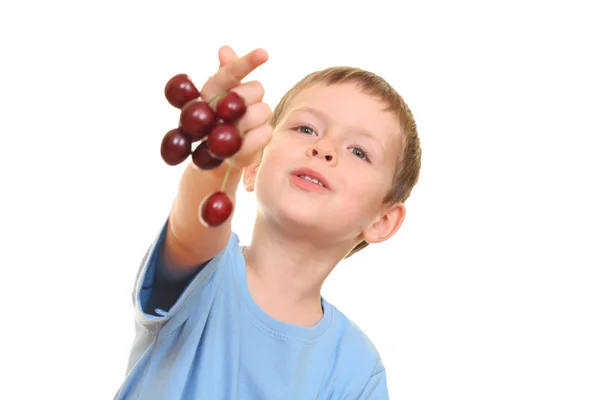 Boy and cherries — Stock Photo, Image