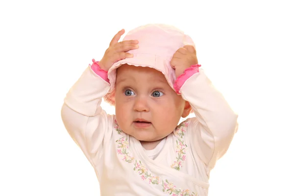 ヶ月の赤ちゃん白で隔離されるピンクの帽子の少女 — ストック写真