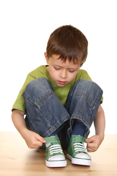 Five Years Old Boy Tries Put His Sneakers Isolated White — Stock Photo, Image