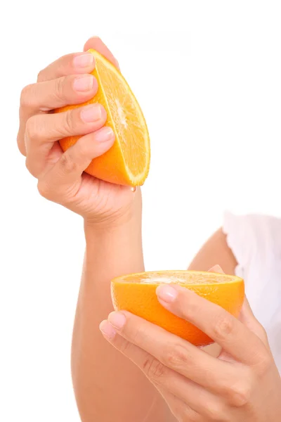 Hands and orange — Stock Photo, Image
