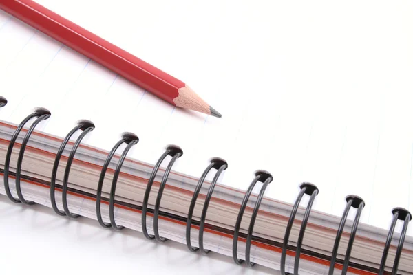 Livro e lápis em espiral — Fotografia de Stock