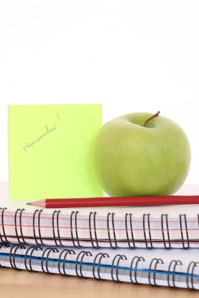 堆螺旋书与苹果和孤立的铅笔 — 图库照片