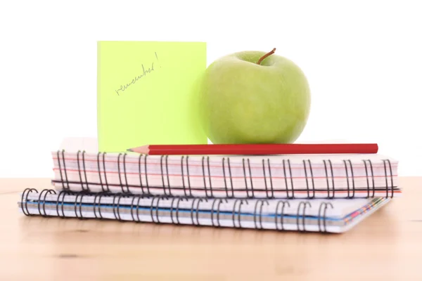 堆螺旋书与苹果和孤立的铅笔 — 图库照片