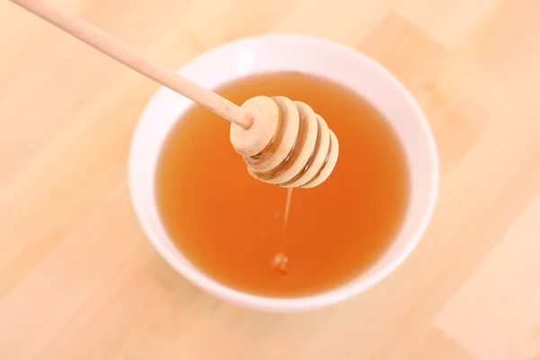 Bowl of honey — Stock Photo, Image