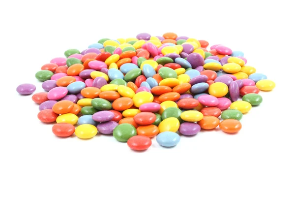Renkli Şekerleri Üzerine Beyaz Izole Yığını — Stok fotoğraf