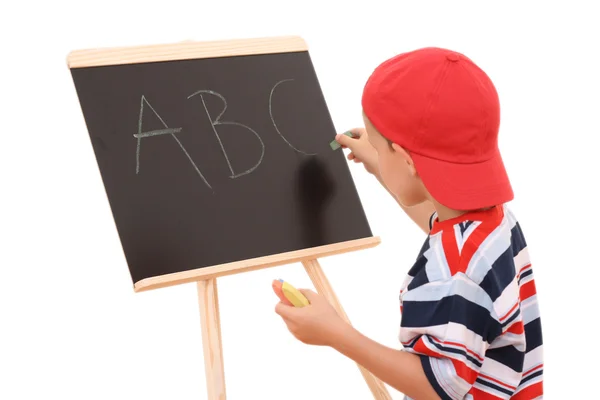 白で隔離される黒板と 歳の少年 — ストック写真