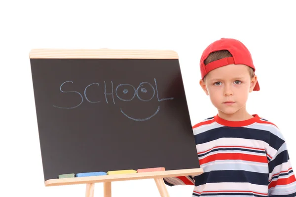 白で隔離される黒板と 歳の少年 — ストック写真