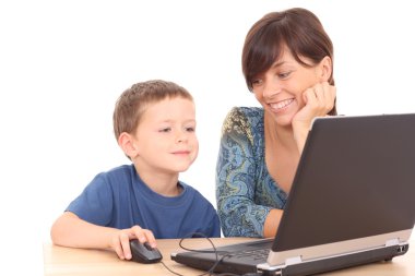 mother and 5-6 years old son having fun with computer game isolated on white clipart