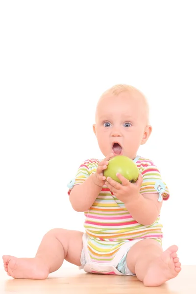 Baby und Apfel — Stockfoto