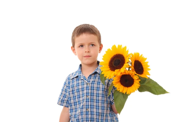 Pojke med blommor — Stockfoto