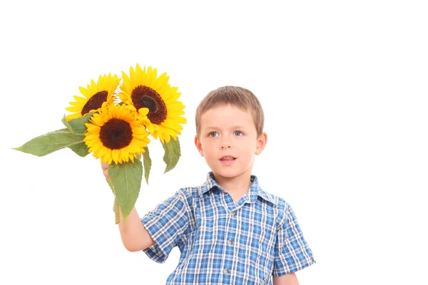 Pojke med blommor — Stockfoto
