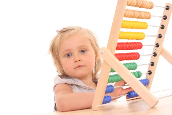 Girl and abacus — Stock Photo, Image