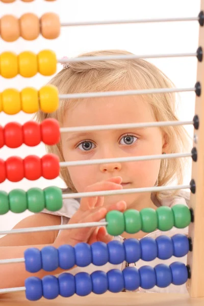 Girl and abacus — Stock Photo, Image