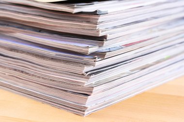 stack of magazines isolated on white clipart