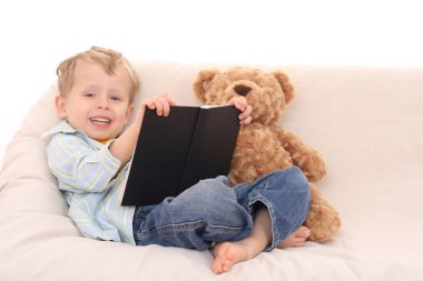 Boy and book clipart