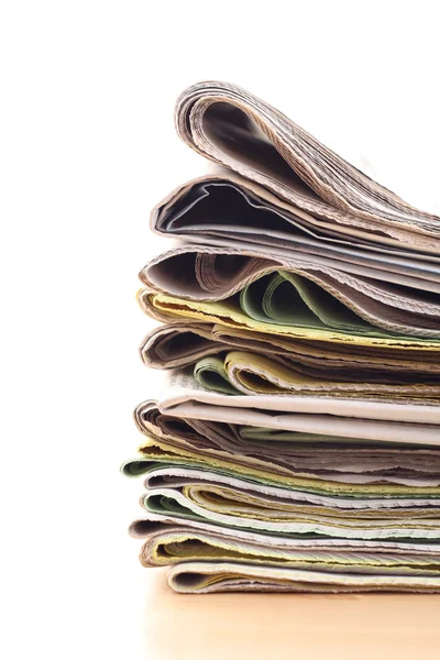 stock image stack of newspapers isolated on white