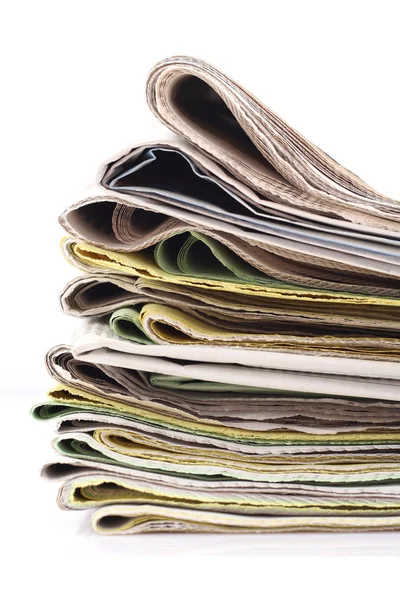 stock image stack of newspapers isolated on white