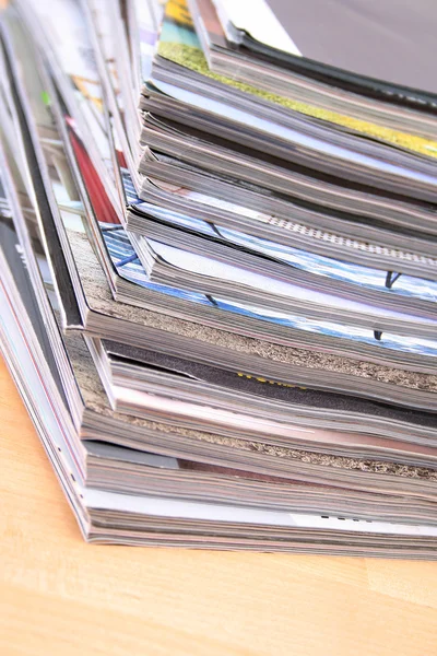 stock image stack of magazines on the table - close-ups