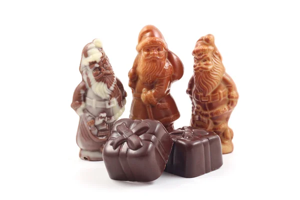 Three Chocolate Santa Some Chocolate Presents Isolated White — Stock Photo, Image