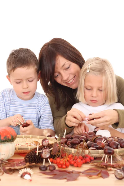 Mother Son Daughter Making Autumn Decoration Isolated White — Stock Photo, Image