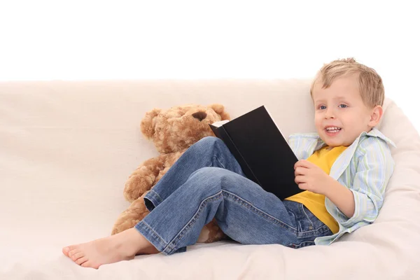 Мальчик и книга — стоковое фото