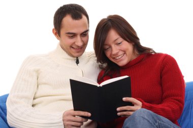 woman and man having fun with book - isolated on white clipart