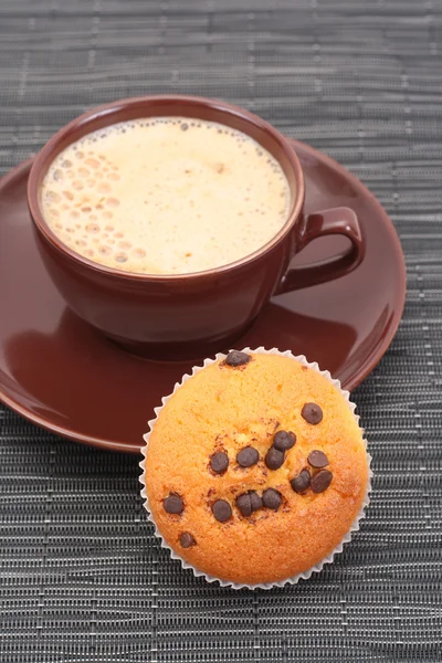 Muffin and cup of coffee — Stock Photo, Image