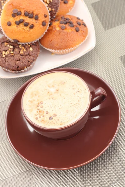 Muffins and cup of coffee — Stock Photo, Image
