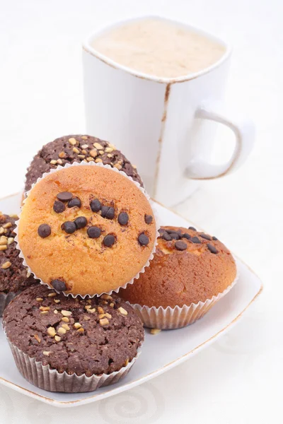 Muffiny a šálek kávy — Stock fotografie