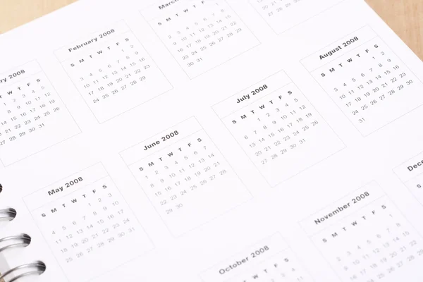 Primeros Planos Del Planificador Del Año Sobre Mesa —  Fotos de Stock