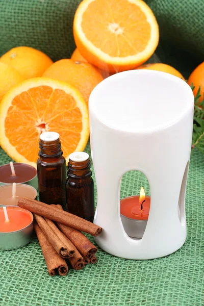 stock image aromatherapy - perfect for winter time - candles and oranges