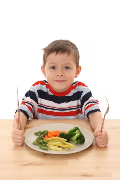 Boy and vegetables — Stock Photo, Image