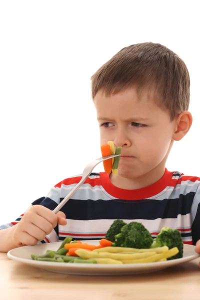 소년과 조리 된 야채 — 스톡 사진