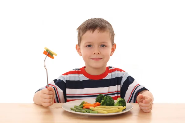 Fiú és főtt zöldségek — Stock Fotó