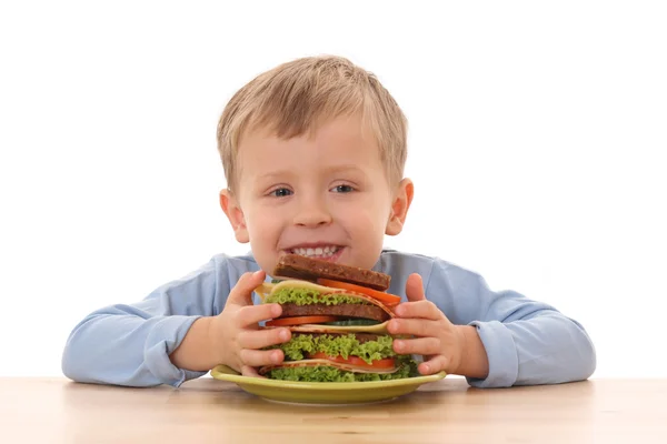 Хлопчик і великий бутерброд — стокове фото