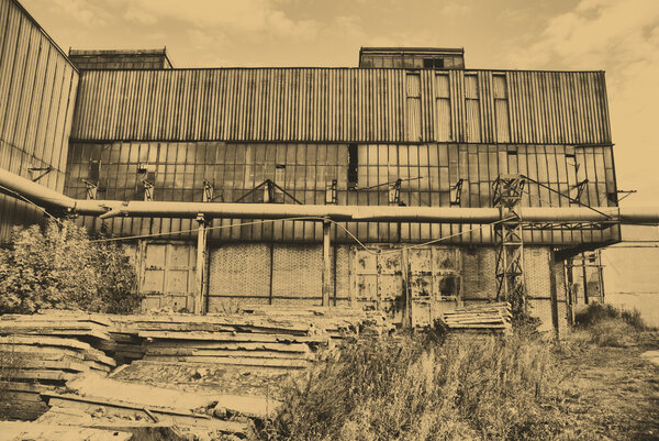 Old style photo of destroyed industrial building