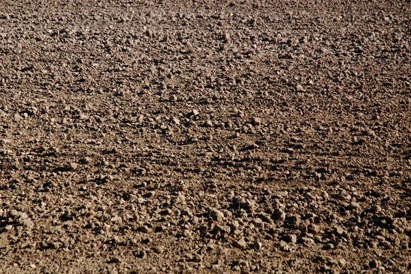 Jordbearbetning brun bakgrund — Stockfoto