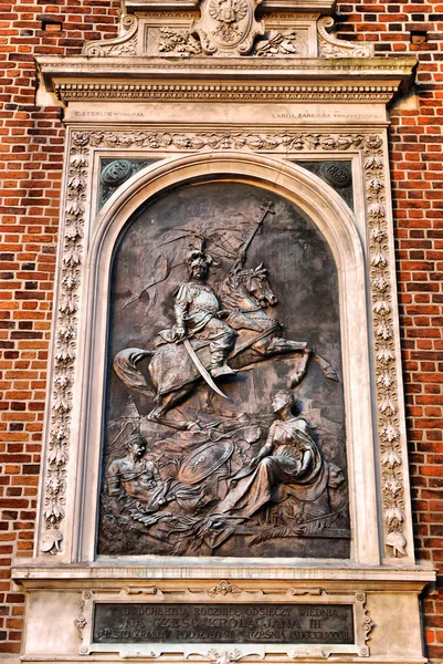 The plaque in the wall of St Mary's Church in Cracow — Stock Photo, Image