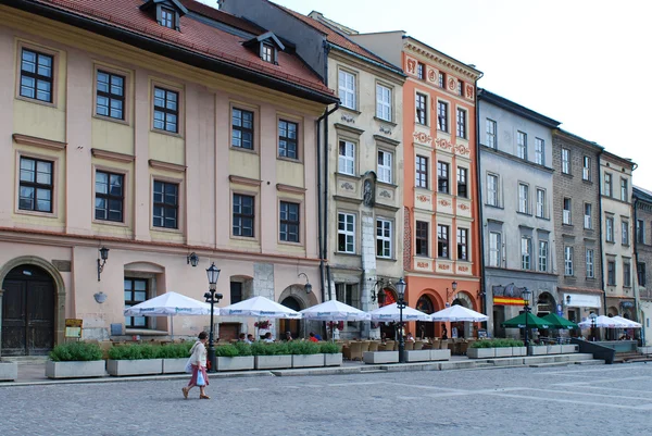 Touristen auf dem maly rynek in Krakau, Polen — Stockfoto
