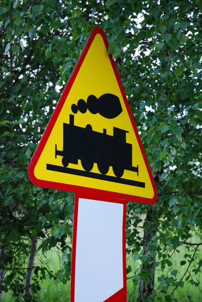 Yellow railroad tracks sign — Stock Photo, Image
