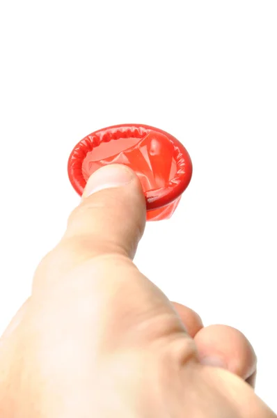 Preservativo na mão — Fotografia de Stock