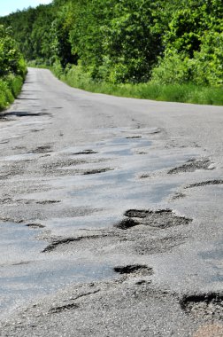 A hole in the road. clipart