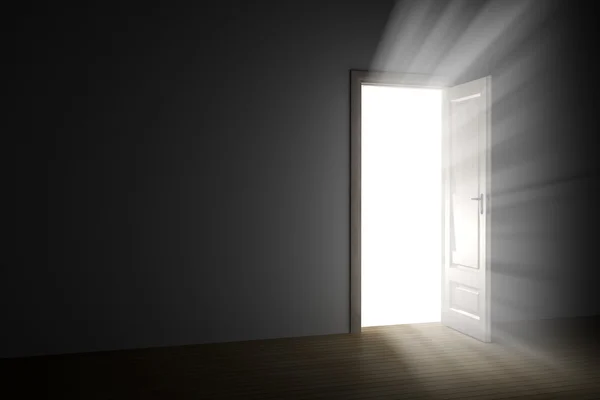 Lumière vive à travers une porte ouverte dans une pièce vide — Photo