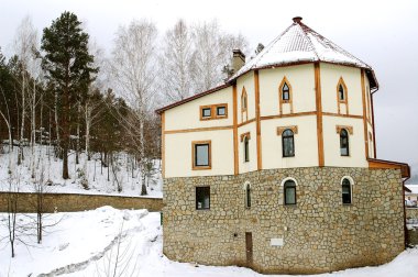 Stone house in mountains clipart