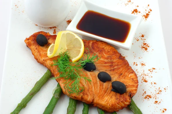 Salmon fried with spices — Stock Photo, Image