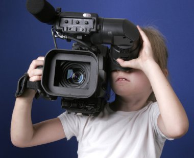 Little girl and big camera clipart