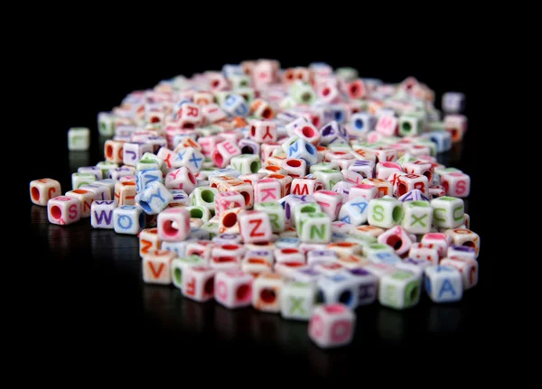 Spielzeugsteine mit Buchstaben — Stockfoto