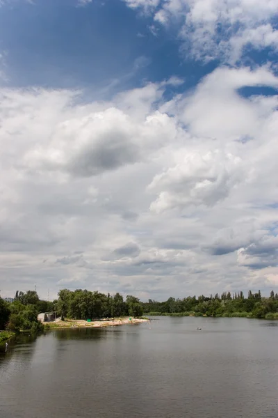 stock image Clouds under river