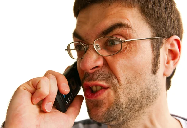 Dühös ember beszél telefonon — Stock Fotó